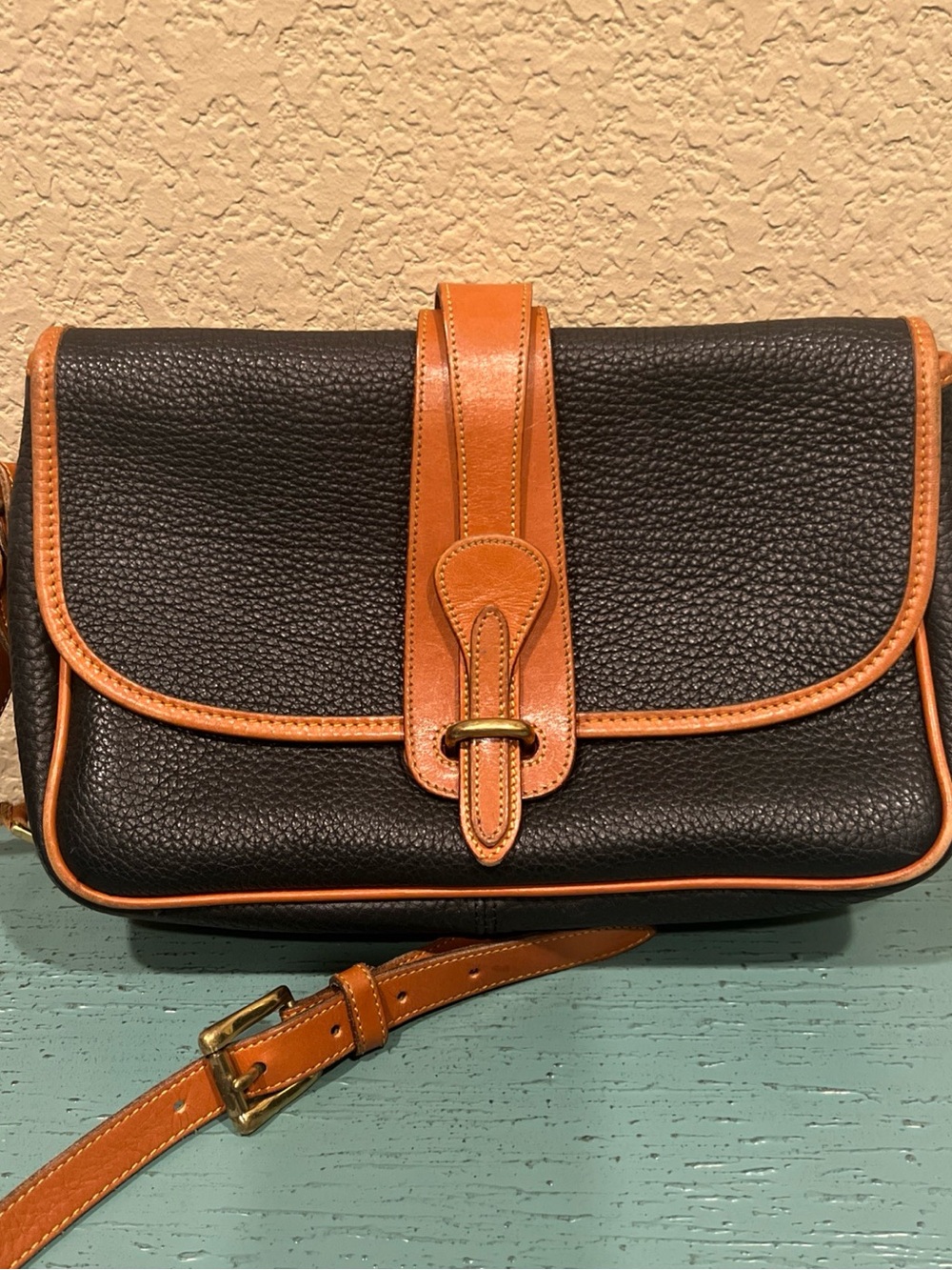 Dooney & Bourke Black Pebbled Leather Tote with Brown Trim